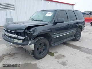 2003 Chevrolet Tahoe LS with VIN 1GNEC13V73R139530, listed as a IAAI auction lot 41598138 with 337,245 mi miles. Bid and sale history available at carsss.com. Image 2.