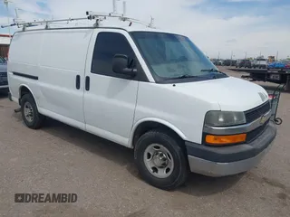 2012 Chevrolet Express Cargo Van with VIN 1GCWGFCA7C1121989, listed as a IAAI auction lot 42118853 with 214,478 mi miles. Bid and sale history available at carsss.com. Image 1.