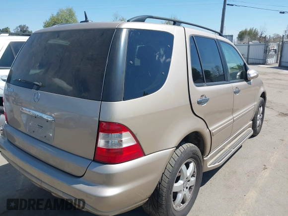2002 Mercedes-Benz M 320/430/500 with VIN 4JGAB75E52A302663, listed as a IAAI auction lot 41865160 with 231,223 mi miles and . Bid and sale history available at DreamBid. Image 4.