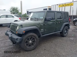 2007 Jeep Wrangler Unlimited X with VIN 1J4GA39127L231378, listed as a IAAI auction lot 42252475 with 152,568 mi miles and . Bid and sale history available at DreamBid. Image 2.