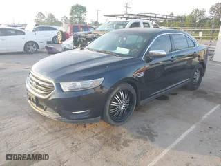 2013 Ford Taurus Limited with VIN 1FAHP2F83DG123026, listed as a IAAI auction lot 42058337 with 194,106 mi miles. Bid and sale history available at carsss.com. Image 2.