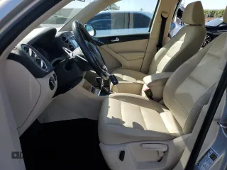 2012 Volkswagen Tiguan SEL with VIN WVGAV7AXXCW521394, listed as a Copart auction lot 53000555 with 126,017 mi miles and Salvage Title. Bid and sale history available at DreamBid. Image 7.