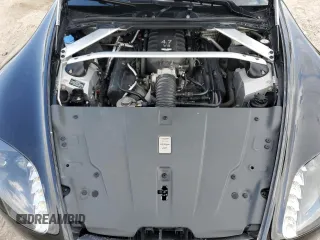 2015 Aston Martin Vantage z VIN SCFEBBAL2FGC18949, wystawiony jako Copart lot #54389965 z przebiegiem Nie podano mil oraz Szkody całkowita. Historia ofert i sprzedaży dostępna na DreamBid. Obrazek 11.