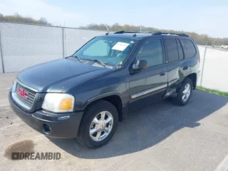 2005 GMC Envoy SLE with VIN 1GKDT13S052299632, listed as a IAAI auction lot 41966628 with 199,312 mi miles and . Bid and sale history available at DreamBid. Image 2.