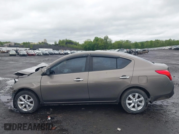 2012 Nissan Versa SV with VIN 3N1CN7AP3CL860116, listed as a IAAI auction lot 42329920 with 105,447 mi miles and . Bid and sale history available at DreamBid. Image 14.