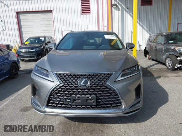 2022 Lexus RX with VIN 2T2HZMAA4NC239034, listed as a IAAI auction lot 41597835 with 33,935 mi miles. Bid and sale history available at carsss.com. Image 12.