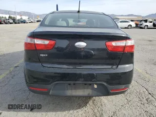 2014 Kia Rio LX with VIN KNADM4A36E6370196, listed as a Copart auction lot 52152155 with 123,672 mi miles and Salvage Title. Bid and sale history available at DreamBid. Image 6.