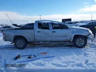 2007 Toyota Tacoma with VIN 5TEMU52N87Z326344, listed as a IAAI auction lot 41250780 with 210,957 mi miles and . Bid and sale history available at DreamBid. Image 14.