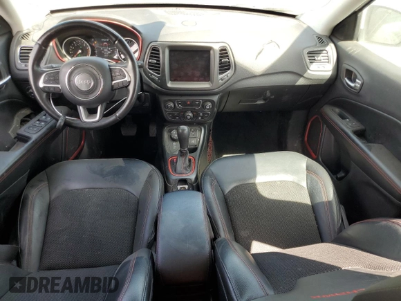2019 Jeep Compass Trailhawk with VIN 3C4NJDDB4KT790351, listed as a Copart auction lot 48588285 with 67,417 mi miles and Salvage Title. Bid and sale history available at DreamBid. Image 8.