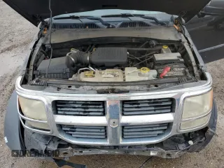2007 Dodge Nitro SXT z VIN 1D8GU28K07W555205, wystawiony jako Copart lot #81165584 z przebiegiem 206 499 mil mil oraz Szkoda całkowita • Salvage title. Historia ofert i sprzedaży dostępna na DreamBid. Obrazek 12.