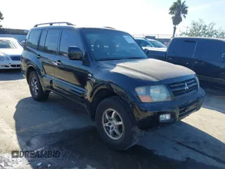 2002 Mitsubishi Montero Limited z VIN JA4MW51R72J014706, wystawiony jako IAAI lot #41829993 z przebiegiem 201 091 mil mil oraz . Historia ofert i sprzedaży dostępna na DreamBid. Obrazek 1.