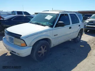 2000 Oldsmobile Bravada with VIN 1GHDT13WXY2284231, listed as a IAAI auction lot 41751228 with 151,477 mi miles. Bid and sale history available at carsss.com. Image 2.