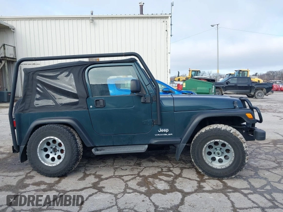 2005 Jeep Wrangler SE with VIN 1J4FA29S45P333916, listed as a IAAI auction lot 41214841 with 90,577 mi miles. Bid and sale history available at carsss.com. Image 13.