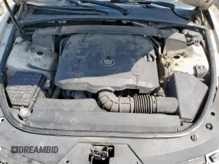 2010 Cadillac CTS Luxury z VIN 1G6DE5EG7A0126205, wystawiony jako Copart lot #57298035 z przebiegiem 168 822 mil mil oraz Szkoda całkowita • Salvage title. Historia ofert i sprzedaży dostępna na DreamBid. Obrazek 11.