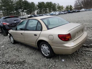 2000 Saturn SL with VIN 1G8ZH5288YZ152688, listed as a Copart auction lot 82878673 with 167,140 mi miles and Salvage title. Bid and sale history available at DreamBid. Image 2.