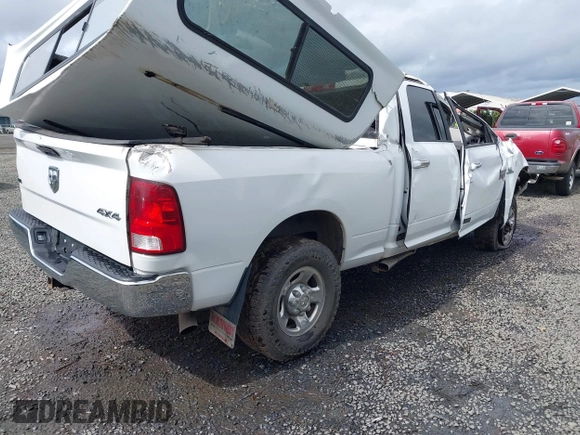 2011 Ram 2500 Laramie Longhorn with VIN 3D7UT2CL4BG589116, listed as a IAAI auction lot 41950008 with 132,282 mi miles and . Bid and sale history available at DreamBid. Image 4.