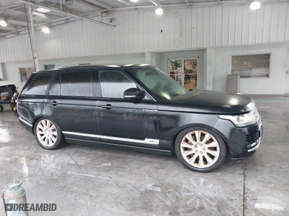 2015 Land Rover Range Rover Supercharged with VIN SALGS3TF4FA214673, listed as a IAAI auction lot 41753240 with 61,450 mi miles. Bid and sale history available at carsss.com. Image 13.