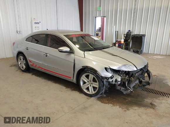 2015 Volkswagen CC Sport with VIN WVWBN7AN1FE816059, listed as a IAAI auction lot 41857589 with 172,854 mi miles and . Bid and sale history available at DreamBid. Image 1.