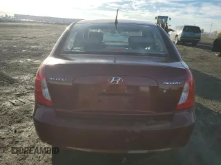 2006 Hyundai Accent GLS with VIN KMHCN46C86U047524, listed as a Copart auction lot 47071055 with 116,918 mi miles and Salvage Title. Bid and sale history available at carsss.com. Image 6.
