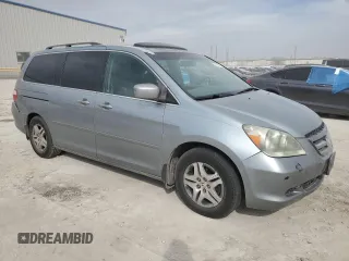 2007 Honda Odyssey EX-L with VIN 5FNRL38657B037355, listed as a Copart auction lot 48905845 with 264,307 mi miles and Salvage Title. Bid and sale history available at carsss.com. Image 4.