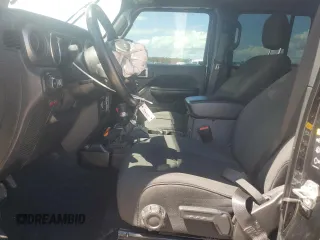 2021 Jeep Wrangler Unlimited Willys with VIN 1C4HJXDN0MW859686, listed as a Copart auction lot 56657725 with 49,984 mi miles and Salvage title. Bid and sale history available at DreamBid. Image 7.