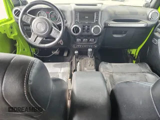 2012 Jeep Wrangler Unlimited Call of Duty MW3 z VIN 1C4BJWFG4CL242211, wystawiony jako Copart lot #59774555 z przebiegiem 117 463 mil mil oraz Szkoda całkowita • Salvage title. Historia ofert i sprzedaży dostępna na DreamBid. Obrazek 8.