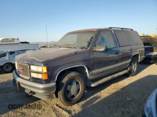 1999 GMC Yukon with VIN 1GKEK13RXXJ748733, listed as a Copart auction lot 74125914 with 172,766 mi miles and Clean Title. Bid and sale history available at carsss.com. Image 1.