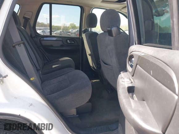 2006 GMC Envoy SLE with VIN 1GKDT13SX62258586, listed as a IAAI auction lot 42045967 with 143,225 mi miles. Bid and sale history available at carsss.com. Image 8.