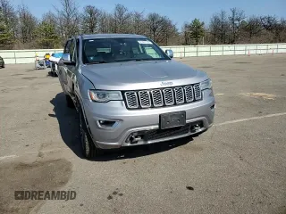 2018 Jeep Grand Cherokee Overland z VIN 1C4RJFCM3JC401399, wystawiony jako Copart lot #53167035 z przebiegiem 87 886 mil mil oraz Nie do naprawy • Non repairable. Historia ofert i sprzedaży dostępna na DreamBid. Obrazek 14.