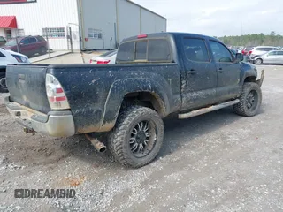 2013 Toyota Tacoma with VIN 3TMMU4FN1DM062090, listed as a IAAI auction lot 41572140 with 246,070 mi miles. Bid and sale history available at carsss.com. Image 4.