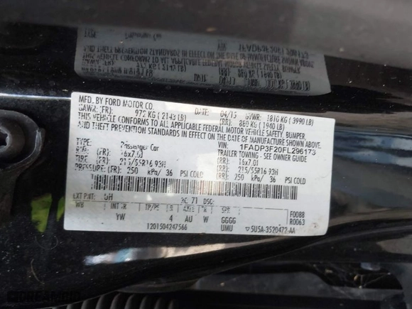 2015 Ford Focus SE with VIN 1FADP3F20FL296173, listed as a IAAI auction lot 41899632 with 136,572 mi miles. Bid and sale history available at carsss.com. Image 9.