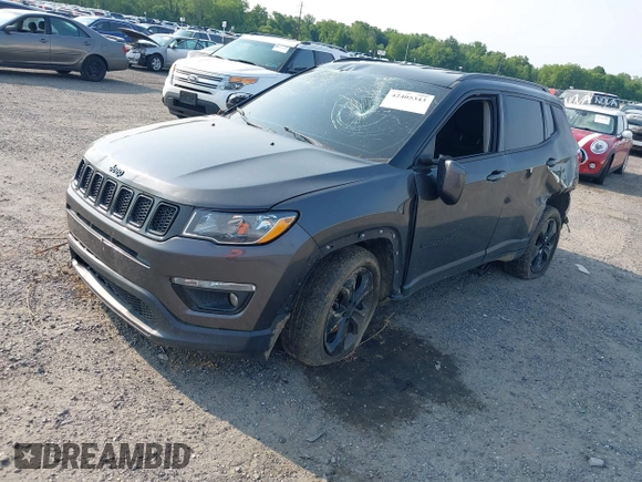 2018 Jeep Compass Latitude with VIN 3C4NJDBB0JT395844, listed as a IAAI auction lot 42405343 with 140,220 mi miles and . Bid and sale history available at DreamBid. Image 2.