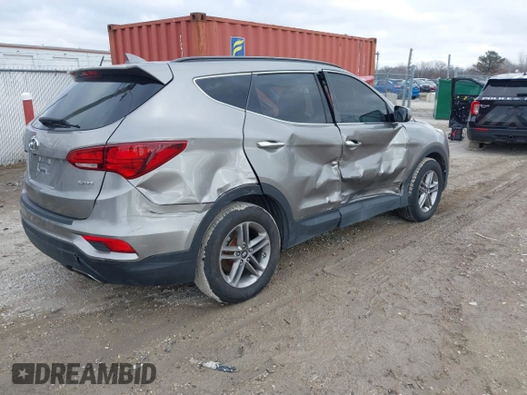 2017 Hyundai Santa Fe 2.4L with VIN 5XYZU3LB4HG424734, listed as a IAAI auction lot 41491166 with 130,905 mi miles and . Bid and sale history available at DreamBid. Image 4.