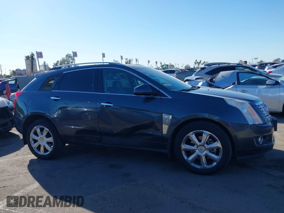 2013 Cadillac SRX Premium Collection z VIN 3GYFNEE37DS525612, wystawiony jako IAAI lot #41344221 z przebiegiem 119 573 mil mil oraz . Historia ofert i sprzedaży dostępna na DreamBid. Obrazek 14.