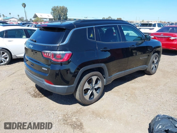 2017 Jeep Compass Latitude with VIN 3C4NJCBB6HT605934, listed as a IAAI auction lot 41846329 with 145,275 mi miles and . Bid and sale history available at DreamBid. Image 4.