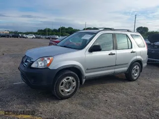2005 Honda CR-V LX with VIN SHSRD68595U302483, listed as a IAAI auction lot 40528497 with 171,311 mi miles. Bid and sale history available at carsss.com. Image 2.