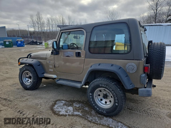 2004 Jeep Wrangler Sahara with VIN 1J4FA59S64P774768, listed as a Copart auction lot 49868895 with 120,800 mi miles and Salvage Title. Bid and sale history available at DreamBid. Image 2.