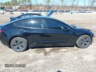 2023 Tesla Model 3 Long Range with VIN 5YJ3E1EB1PF632595, listed as a IAAI auction lot 41754131 with 8,147 mi miles and . Bid and sale history available at DreamBid. Image 13.