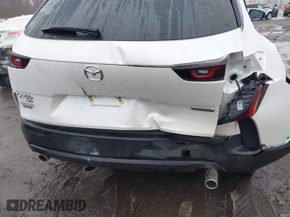 2024 Mazda CX-50 S Premium with VIN 7MMVABDM8RN162809, listed as a IAAI auction lot 41511222 with 12,516 mi miles and . Bid and sale history available at DreamBid. Image 6.