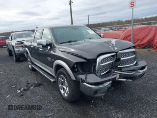 2016 Ram 1500 Laramie z VIN 1C6RR7NT1GS197534, wystawiony jako IAAI lot #41693632 z przebiegiem 98 421 mil mil oraz . Historia ofert i sprzedaży dostępna na DreamBid. Obrazek 1.