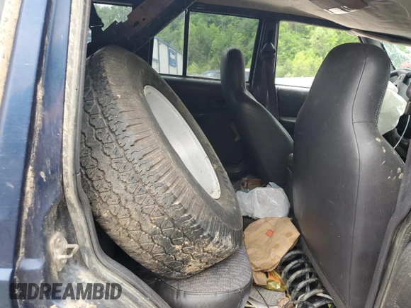 2001 Jeep Cherokee Sport with VIN 1J4FF48S21L595966, listed as a Copart auction lot 55946575 with Not provided miles and Salvage title. Bid and sale history available at DreamBid. Image 11.