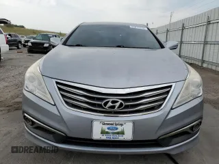 2016 Hyundai Azera z VIN KMHFG4JG2GA506616, wystawiony jako Copart lot #65019115 z przebiegiem 93 770 mil mil oraz Czysty tytuł • Clean title. Historia ofert i sprzedaży dostępna na DreamBid. Obrazek 5.