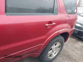 2005 Ford Escape Limited with VIN 1FMYU94155KA52665, listed as a IAAI auction lot 41736416 with 999,999 mi miles. Bid and sale history available at carsss.com. Image 6.