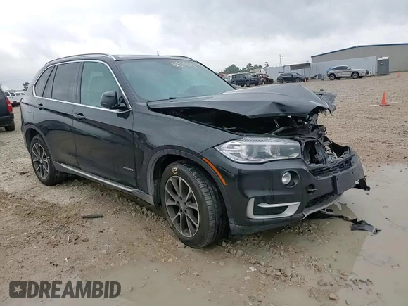 2014 BMW X5 xDrive35i z VIN 5UXKR0C59E0H23070, wystawiony jako Copart lot #55814815 z przebiegiem 113 895 mil mil oraz Szkody całkowita. Historia ofert i sprzedaży dostępna na DreamBid. Obrazek 13.