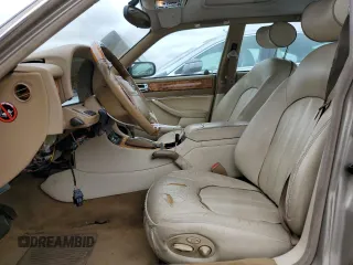1997 Jaguar XJ Vanden Plas with VIN SAJKX6245VC800386, listed as a Copart auction lot 53651675 with 158,185 mi miles and Salvage Title. Bid and sale history available at DreamBid. Image 7.