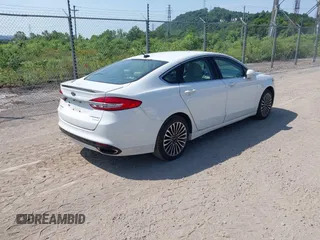 2017 Ford Fusion Titanium with VIN 3FA6P0K90HR168031, listed as a IAAI auction lot 42578926 with 210,268 mi miles and . Bid and sale history available at DreamBid. Image 4.