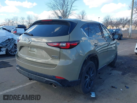 2024 Mazda CX-5 Carbon Edition with VIN JM3KFBAYXR0371954, listed as a IAAI auction lot 41688598 with 13,230 mi miles and . Bid and sale history available at DreamBid. Image 4.