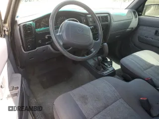 2000 Toyota Tacoma with VIN 5TEWN72N8YZ717707, listed as a Copart auction lot 54479455 with 197,407 mi miles and Salvage title. Bid and sale history available at DreamBid. Image 8.