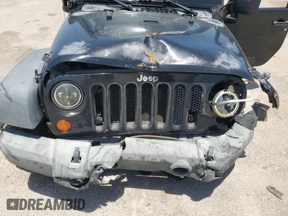 2008 Jeep Wrangler Unlimited X z VIN 1J4GA391X8L532319, wystawiony jako Copart lot #57292495 z przebiegiem Nie podano mil oraz Szkoda całkowita • Salvage title. Historia ofert i sprzedaży dostępna na DreamBid. Obrazek 11.