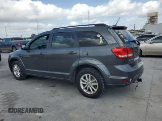 2014 Dodge Journey SXT with VIN 3C4PDCBG8ET140984, listed as a Copart auction lot 54408445 with 135,290 mi miles and Salvage Title. Bid and sale history available at DreamBid. Image 2.